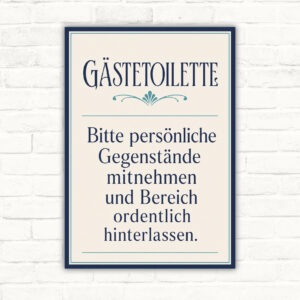 Gästetoilette Schild mit Text „Bitte persönliche Gegenstände mitnehmen und Bereich ordentlich hinterlassen“.