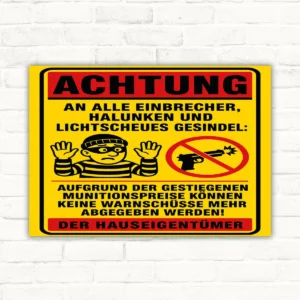 Achtung Einbrecher Schild mit Humor, gelb-rotem Motiv und Einbrecherfigur als bedrucktes Warnschild im Hochformat.