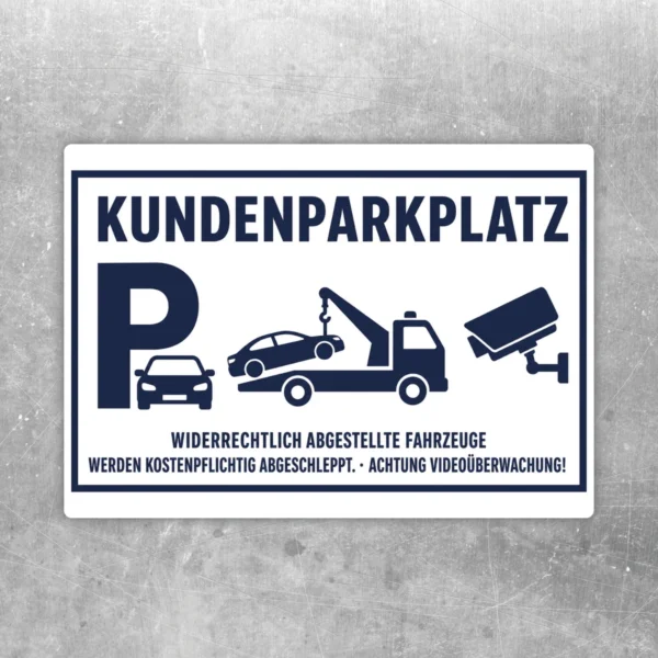 Kundenparkplatz mit Videoüberwachung Aufkleber in Weiß und Dunkelblau mit Abschleppsymbol und Kameramotiv auf Querformat.