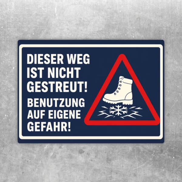 Warnaufkleber mit Text „Dieser Weg ist nicht gestreut! Benutzung auf eigene Gefahr!“ und rotem Warndreieck mit Stiefel auf Eisfläche.