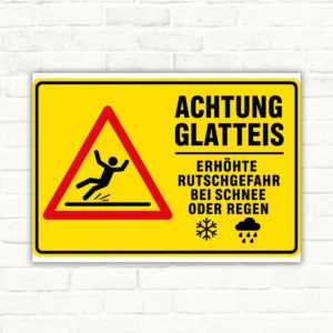 Achtung Glatteis Warnschild mit rotem Dreieck, ausrutschender Person und Text gegen Rutschgefahr bei Schnee oder Regen.