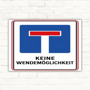 Bedrucktes Schild mit blauem T-Symbol und dem Text „KEINE WENDEMÖGLICHKEIT“ als Hinweis auf fehlenden Wendemöglichkeit.