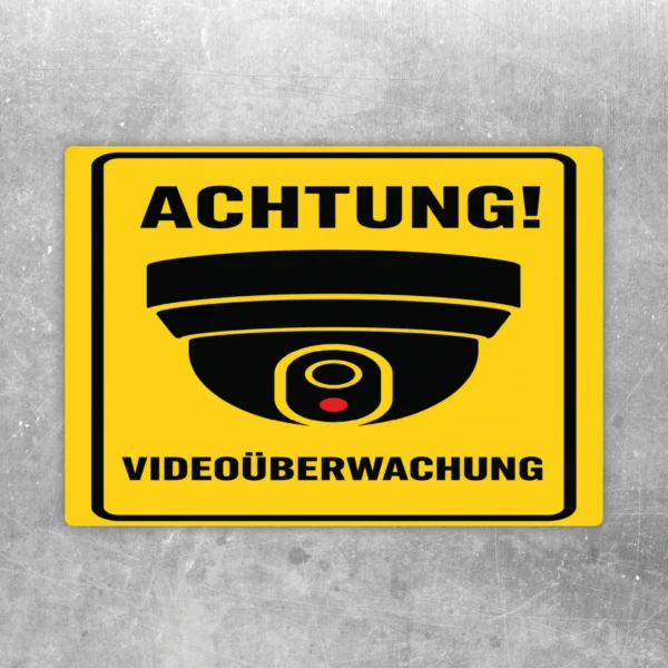 Videoüberwachung Aufkleber mit gelbem Warnhintergrund, Kamerasymbol und dem Text Achtung und Videoüberwachung.