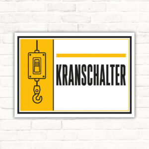 Kranschalter Kennzeichnung als querformatiges Schild mit gelber Symbolfläche und großem Schriftzug KRANSCHALTER.