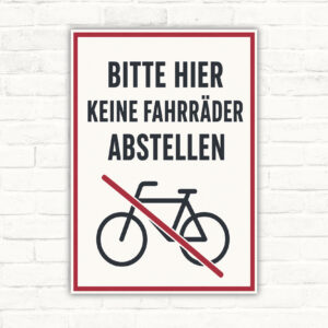 Schild mit dem Text „Bitte hier keine Fahrräder abstellen“ und durchgestrichenem Fahrrad in Rot und Schwarz.