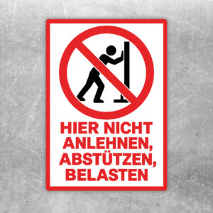 Nicht anlehnen Aufkleber – Hier nicht anlehnen, abstützen oder belasten als Standardmockup im Hochformat mit gut lesbarem Motiv.
