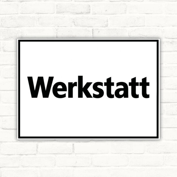 Originalmotiv: schwarzer Schriftzug Werkstatt auf weißem Querformat mit schwarzem Rahmen als Schild