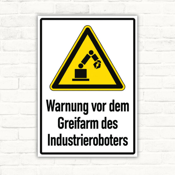 Originalmotiv: gelbes Dreieck mit Roboterarm und Text Warnung vor dem Greifarm des Industrieroboters als Schild